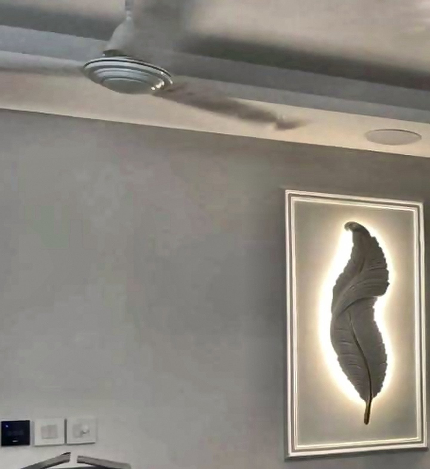 False ceiling with cove lighting and a chandelier in a Goregaon West living room