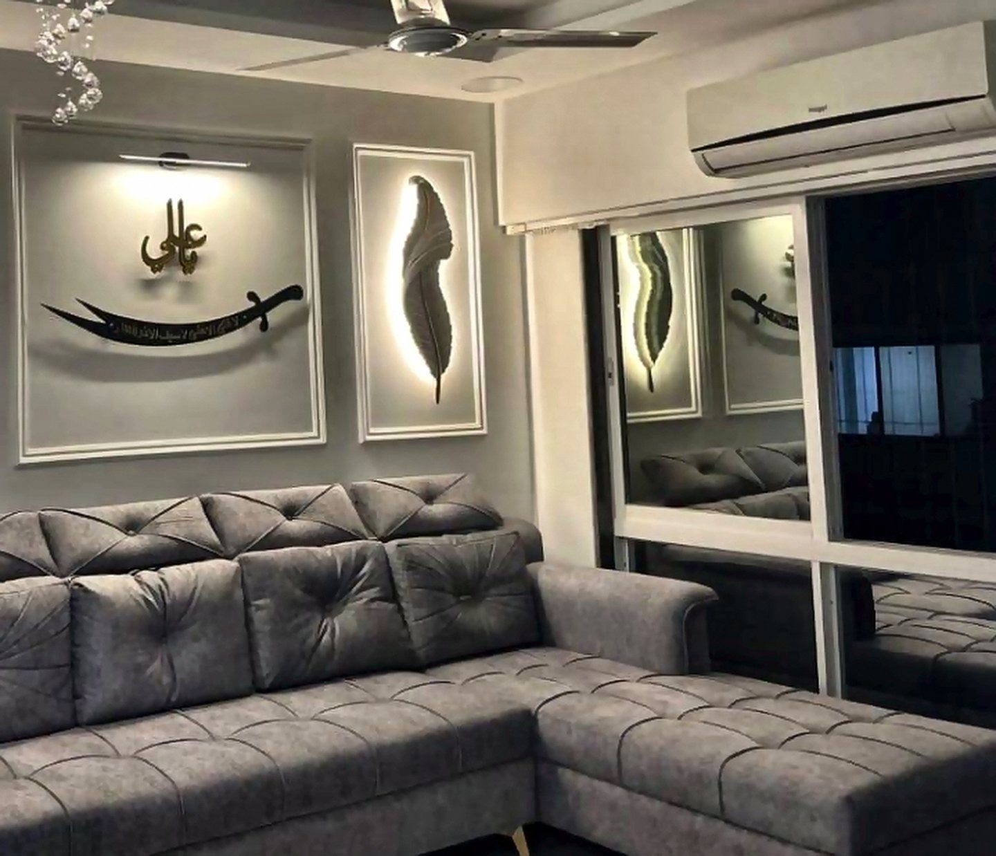 Grey L-shaped sofa in a Mumbai living room used to preview interior colour palettes